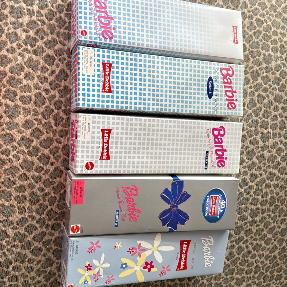 Complete set of NIB little Debbie Collector’s Barbie’s